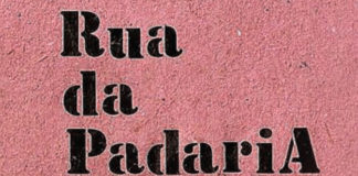 Recorte da capa do livro "Rua da Padaria". Na imagem, o título do livro em preto num fundo rosa texturizado.