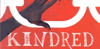 Recorte da capa do livro. Um fundo vermelho, no topo o desenho de uma mão dentro de um elo gigante de uma corrente. Abaixo, o título: "Kindred Laços de Sangue"